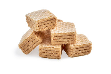 heap of chocolate square honey wafer biscuits isolated on white