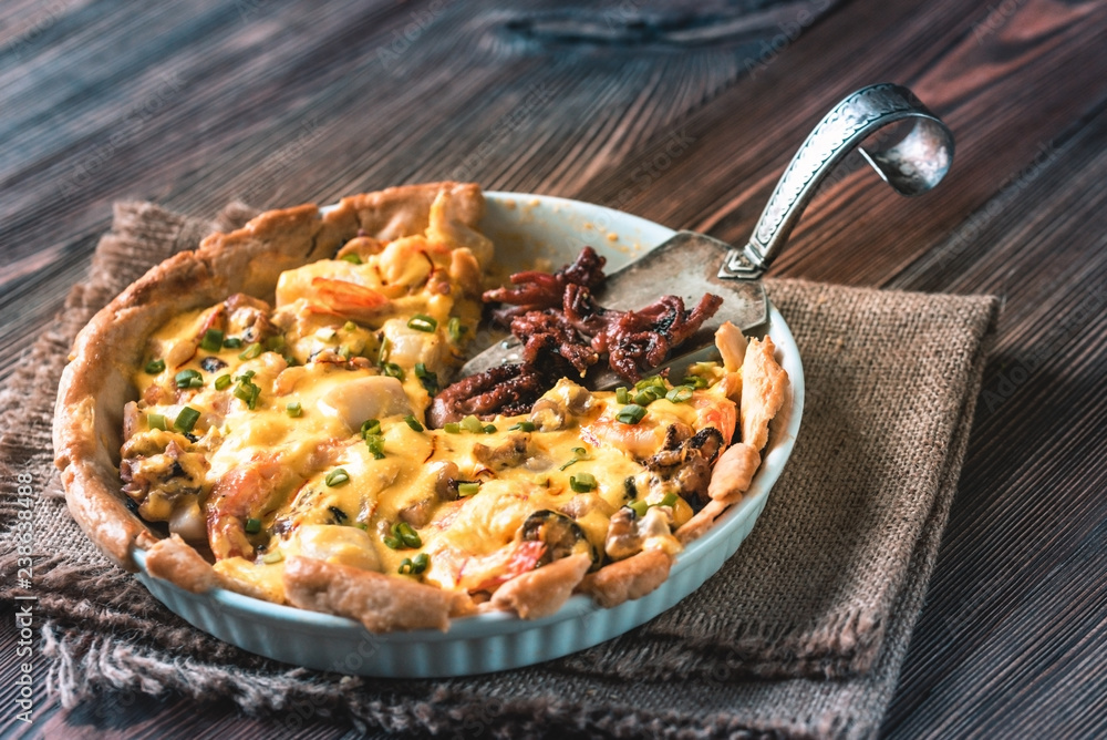 Wall mural seafood pie with saffron cream sauce