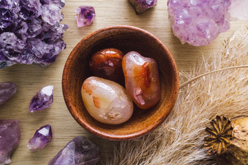 Teak Bowl of Carnelian with Amethyst Crystals and Dried Poppy Flower