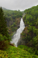Amazing view of Sivlefossen fall, seen from Stalheimskleiva road. This is one of the most beautiful waterfalls in Norway located north of the village Voss in the region of Hordaland.