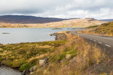 West fjords lonely road in scenic landscape, Iceland