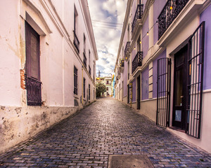 Fototapeta na wymiar Old San Juan Puerto Rico View of architecture along narrow street
