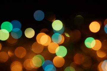 Obraz premium natural bokeh holiday lights background bright lights green yellow blue party city