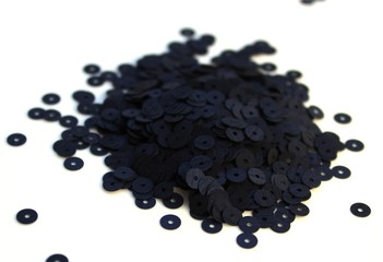 pile of black sesame seeds isolated on white