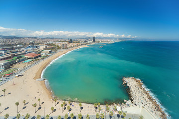 Aerial view of Barcelona Beach in summer day along seaside in Barcelona, Spain. Mediterranean Sea in Spain.