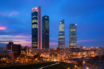 Fototapeta na wymiar Madrid Four Towers financial district skyline at twilight in Madrid, Spain.