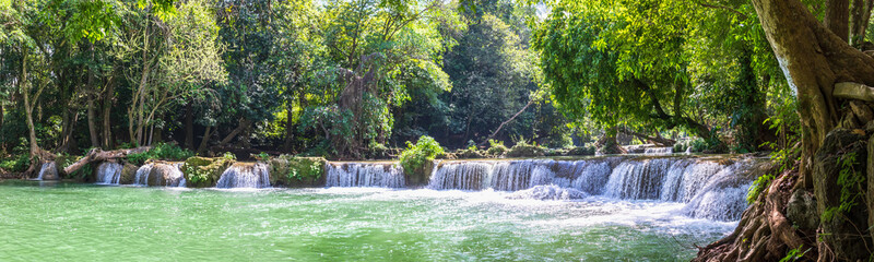 Waterfall in a forest on the mountain in tropical forest