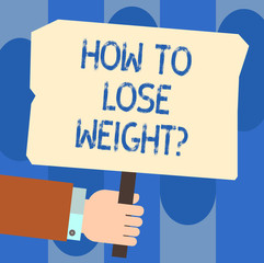 Writing note showing How To Lose Weightquestion. Business photo showcasing Strategies to get fitter stop being fat Hu analysis Hand Holding Colored Placard with Stick Text Space