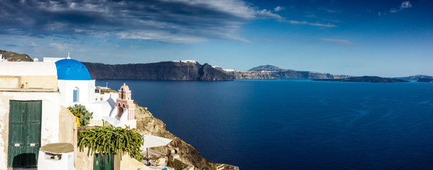 Obraz premium View of Church with seascape and mountain; Santorini island; Greece