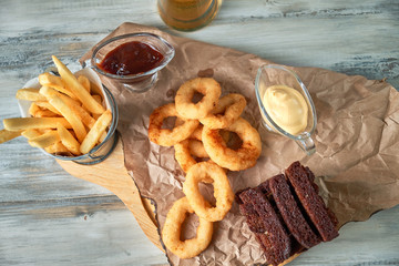 a variety of snacks for light beer in a glass