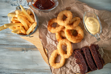 a variety of snacks for light beer in a glass