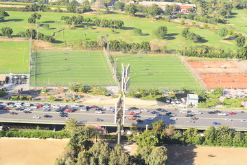 Nile river in Cairo Egypt during the day with boats running and high building surrounding river banks