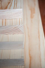 Wood boards. Timber in stock. Many new boards in stock. Planed boards are stacked.