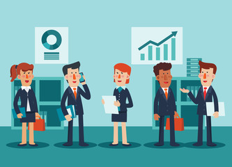 Young businessmen and business women talking and discussing in office