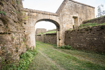 Fototapeta na wymiar old castle with its high walls around it