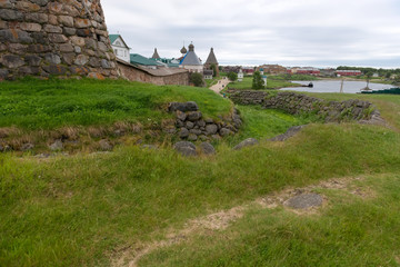 Protective moat near the  Korozhnaya tower of the Solovki Kremlin on a cloudy day