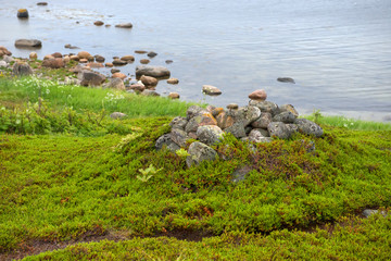 Huge stones on the coastline of the Bolshoy Zayatsky Island. Solovetsky archipelago, White sea, Russia