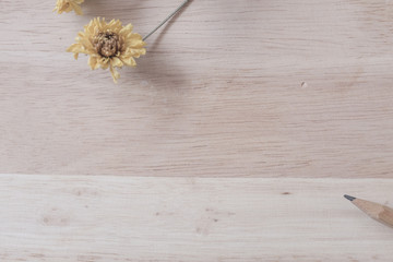 flowers on wooden background