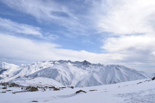 Mount Apharwat at a height of 4390 metres in Gulmarg, Kashmir, India. It lies in Pir Panjal mountain range. The LOC is few kms away from here & it remains covered with heavy snow throughout the year.