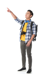 Excited curious tourist pointing at something interesting, isolated on white