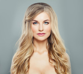 Naklejka premium Beautiful girl with blonde hair. Fashion model woman portrait