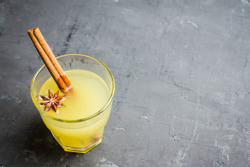 Old fashioned citrus beverage with spices. Selective focus. Shallow depth of field.