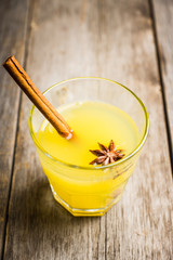 Old fashioned citrus beverage with spices. Selective focus. Shallow depth of field.