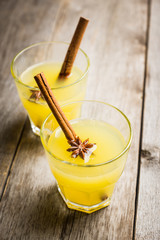 Old fashioned citrus beverage with spices. Selective focus. Shallow depth of field.