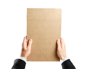 Obraz premium Hands in white shirt and black jacket holding a piece of cardboard. Isolated on a white background. Prepared for your text