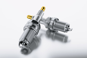 Spare parts spark plugs on white background for car and motorcycle. New auto parts spark plug.