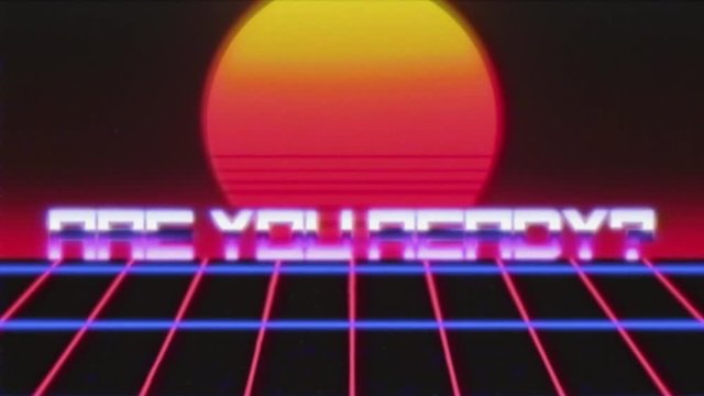 VHS tape screen capture: a retro futuristic animation of a twilight sun appearing over a grid moving forward, with the text Are you ready?

