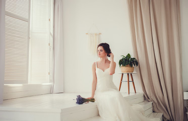 Beautiful luxury bride in elegant white dress