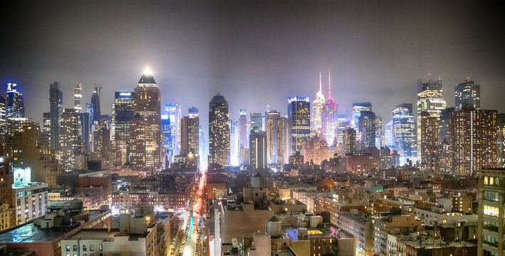 Midtown Manhattan aerial view at night as seen from Hell's Kitchen rooftop