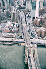 Overhead aerial view of Brooklyn Bridge from helicopter, New York City in winter