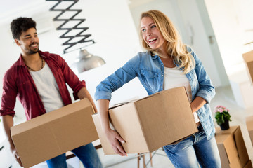 Happy couple after moving in a new home