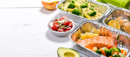 Healthy food delivery concept - meals in fossil containers, top view