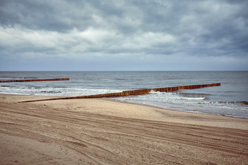 Seascape with moody sky, color toning applied.