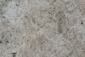 Closeup fragment of grunge weathered wall of a building, Aged cracked concrete stone plaster wall background and texture style