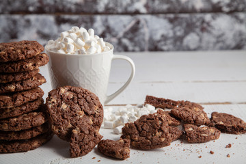 Round homemade cookies with cocoa and marshmallows.