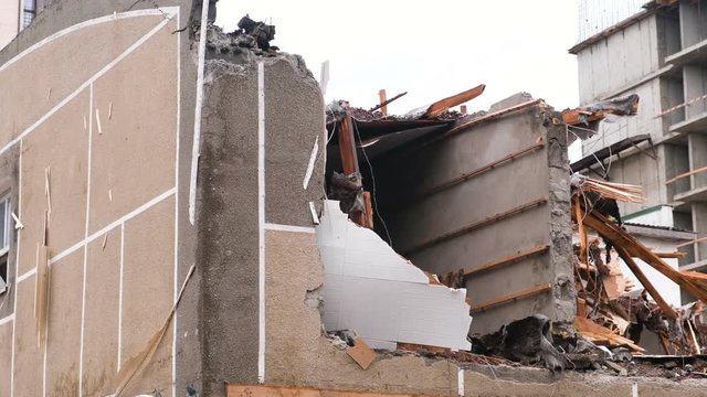 Destroyed the apartment building after the disaster.