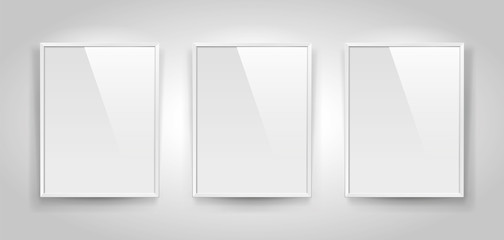 Three realistic empty rectangular white frames with passepartout on gray background, border for your creative project, mock-up sample, picture on the wall, vector design object