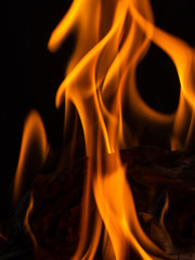 fire flames on black background, burning newspaper,