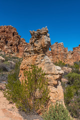 Fototapeta na wymiar Rock formation, resembling a person with a crown, at Truitjieskraal