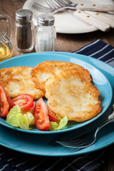 Crispy fried homemade potato pancakes.