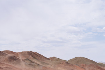 Barren gobi desert landscape under sky at the historical site of Yang Pass, in Yangguan, Gansu, China