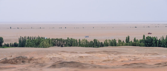 Fototapeta na wymiar Barren gobi desert landscape under sky at the historical site of Yang Pass, in Yangguan, Gansu, China