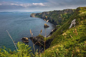 Panoramic view along beautiful rugged coastline at Kinbane, Northern Ireland.  Rocky Atlantic coastline on Causeway Coastal Route