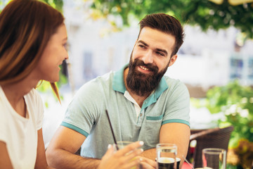 Fototapeta premium Beautiful couple having coffee on a date