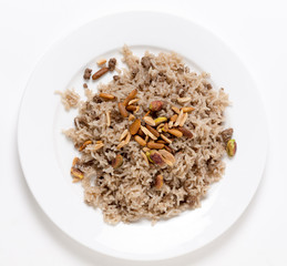 Top view of a plate of Lebanese spiced rice and beef