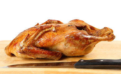 Roast duck and knife